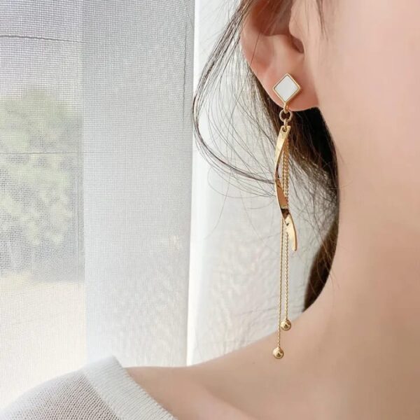 Seaa's geometric shape twisted long dangling earrings
